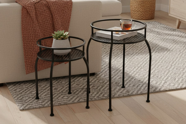 view of a coastal Mediterranean village on a hillside, with small boats in the water.